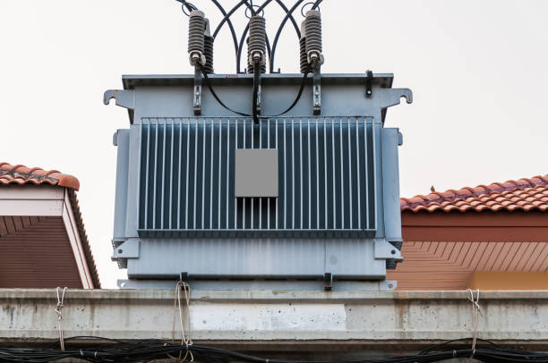 istock Electric transformer near house 656700768