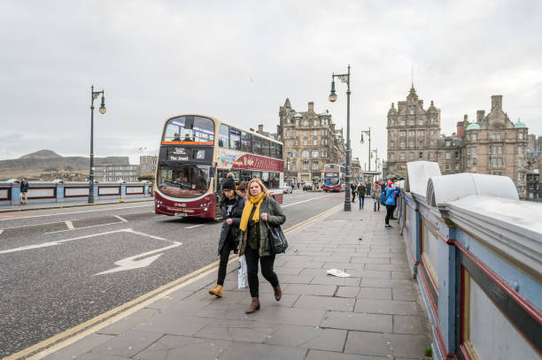 Edinburgh, Scotland - December 30, 2016: People are walking on the North Bridge in Edinburgh, Scotland, UK