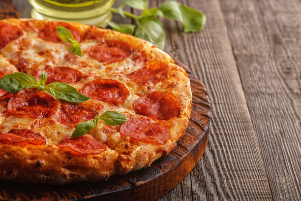 istock Pepperoni pizza with mozzarella cheese and tomato sauce 656709200
