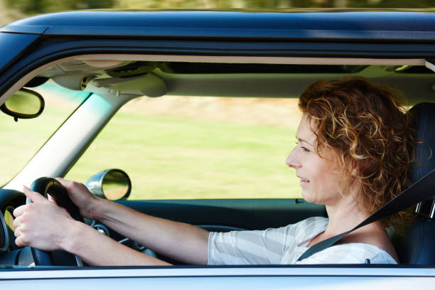 istock Older woman driving car 656711698