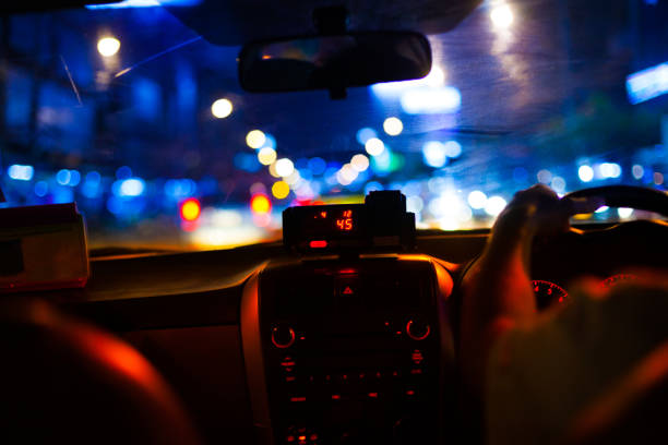 istock Taxi in Traffic Jam at Night 656718160