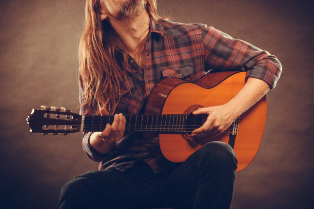 istock Guitarist is playing the guitar. 656718356
