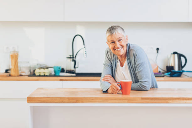 istock Smiling senior woman resting with a coffee cup 656733158