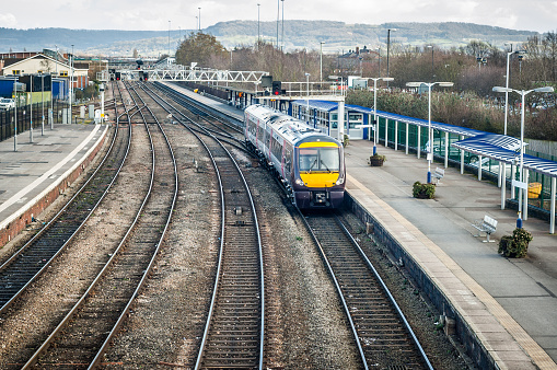 A train pulling into a station in the UK.