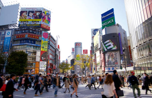 istock Shibuya scramble crossing a busy day 656740358