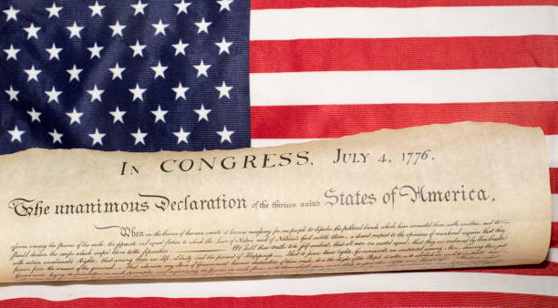 istock Declaration of independence 4th july 1776 on usa flag 656743786