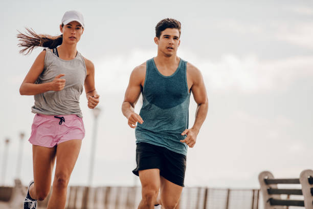 istock Young people running outdoors 656752632