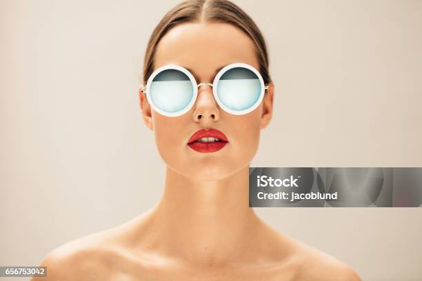 Pretty Young Woman With Glasses Stock Photo - Download Image Now - Sunglasses, Women, One Woman Only