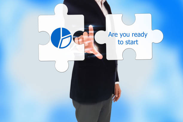 istock businessman pressing are you ready to start button 656758442