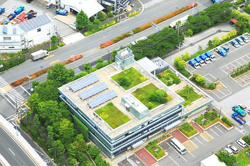 Rooftop gardens Tokyo high-rise buildings with solar power panels