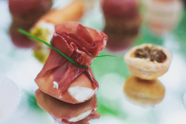 istock Beautifully decorated catering banquet table with different food snacks 656765298