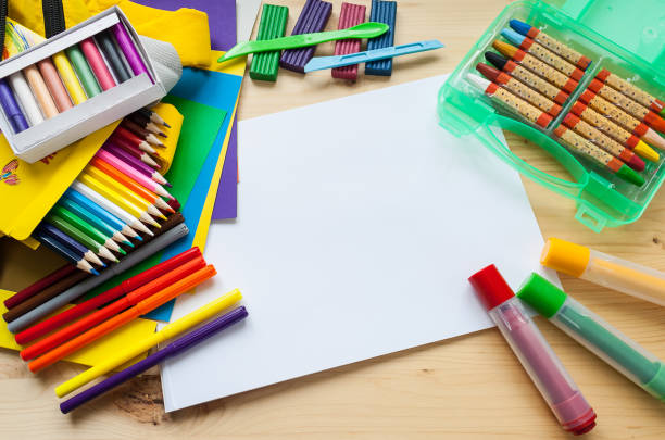istock children's creativity. frame with stationery flat lay on wood background 656766156