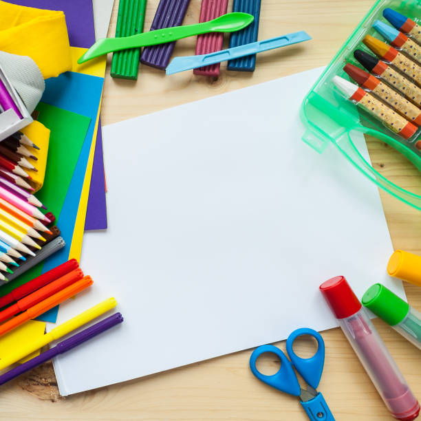 istock children's creativity. frame with stationery flat lay on wood background 656766168