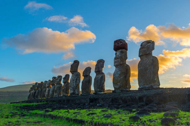 Easter Island Sunshine The sun shining at sunrise on the fifteen Moai of the Easter Island in the Pacific Ocean, Chile. moai statue rapa nui stock pictures, royalty-free photos & images