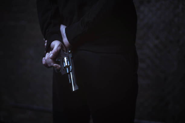istock Scary young man planning a crime 656773806