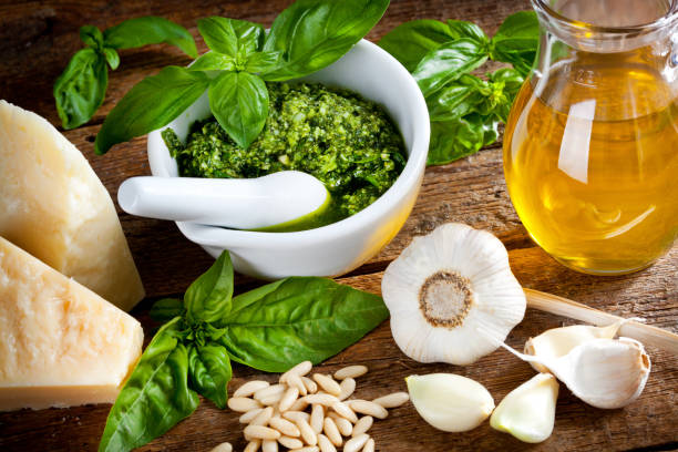 Ingredients for pesto sauce. Ingredients for italian pesto sauce (pesto alla genovese). pesto sauce stock pictures, royalty-free photos & images