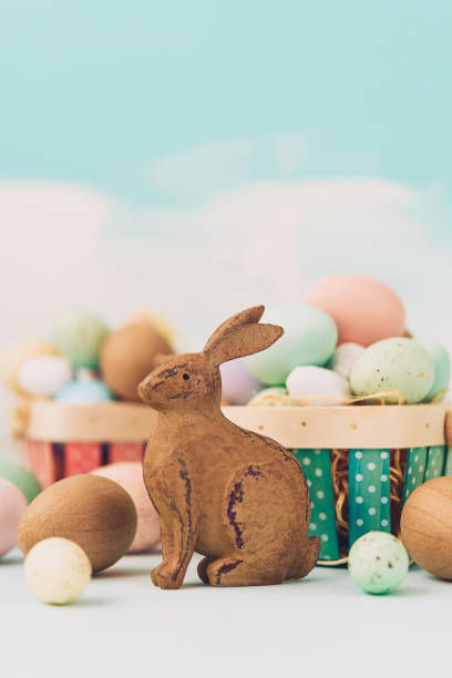 istock Easter still life arrangement with rustic bunny and speckled eggs 656780222