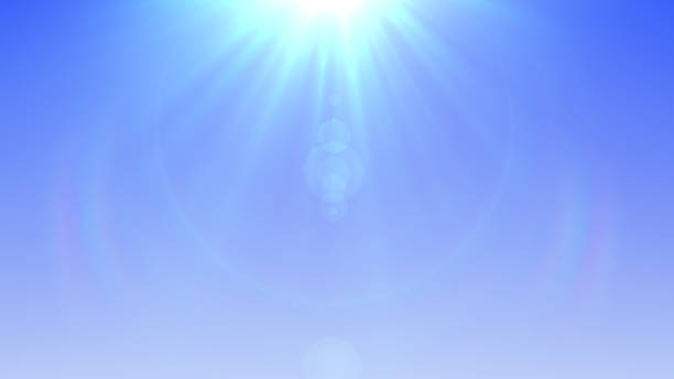 istock Sun lens flare in blue background (very high resolution) 656783158