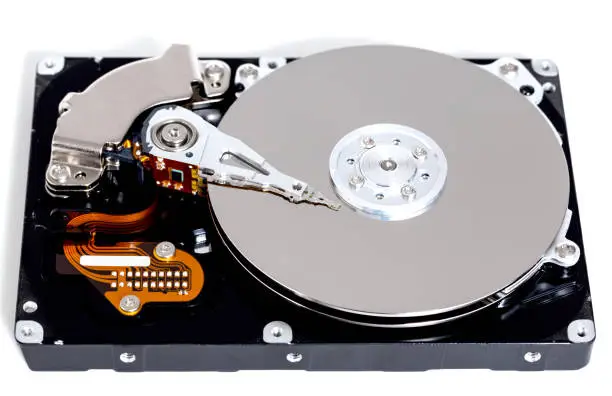 Photo of Open hard drive against white background