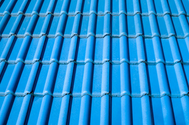 New blue roof with ceramic tiles closeup