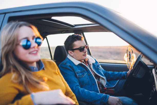 istock Couple on a road trip enjoying sunset 656793792