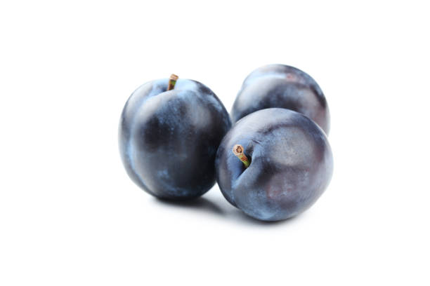 istock Tasty and ripe plums isolated on a white 656800562
