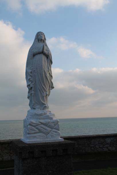 istock St. Mary Statue overlooking ocean 656800750