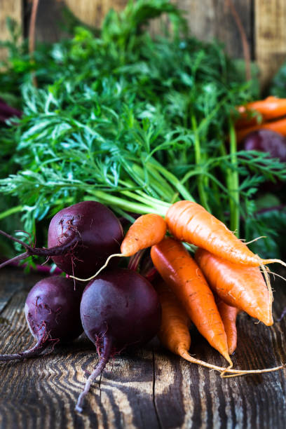 istock Bunch of fresh organic beetroots and carrots 656801324