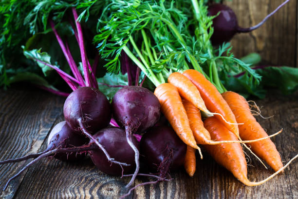 istock Bunch of fresh organic beetroots and carrots 656801334