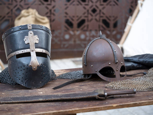 istock Helmets medieval of knights on a table 656804244