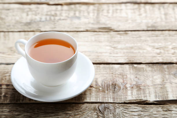 istock Cup of tea on a grey wooden table 656808296