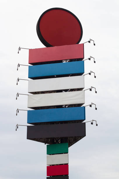 front view of industrial park branding totem with empty colored signage billboards