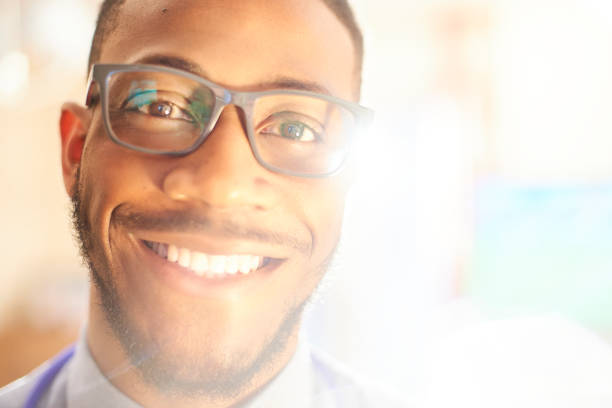 istock Young black male smiling and looking to camera 656831614
