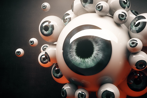 Close up of abstract group of blue eyeballs on dark background. 3D Rendering