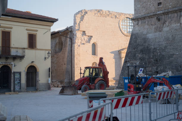 The works to ensure the buildings after the earthquake Norcia, Italy - March 15, 2017: The works to secure buildings in Norcia after the violent earthquake of October 30, 2016 magnitude 6.5 with its epicenter just 4 km to the north of the country 2016 stock pictures, royalty-free photos & images