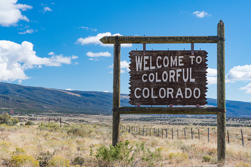 Welcome to colorful Colorado sign along the Colorado and Utah border.