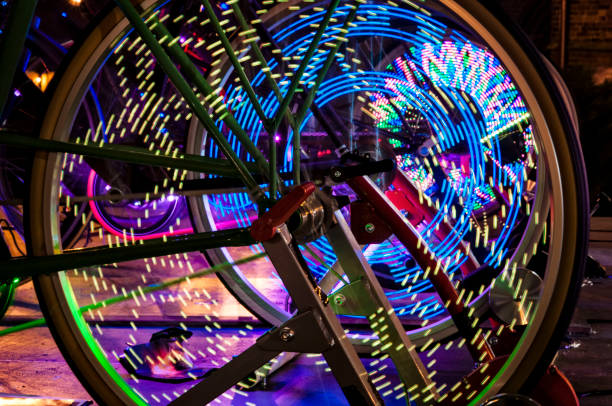 istock Abstract play of light with lights in bicycle wheel spokes. 656838564