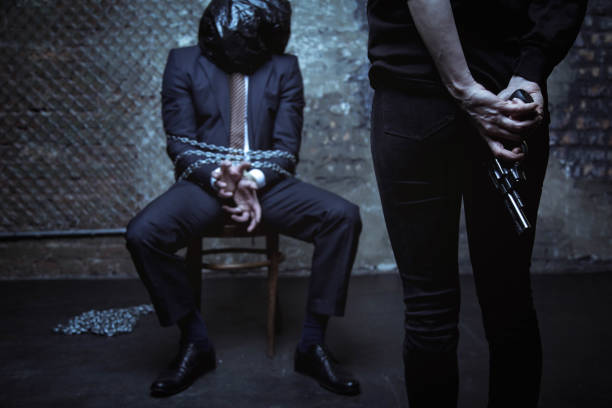 istock Defenseless businessman being prosecuted by an abductor 656838996