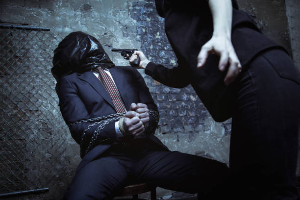 istock Dangerous fierce kidnapper yelling at the hostage 656839100