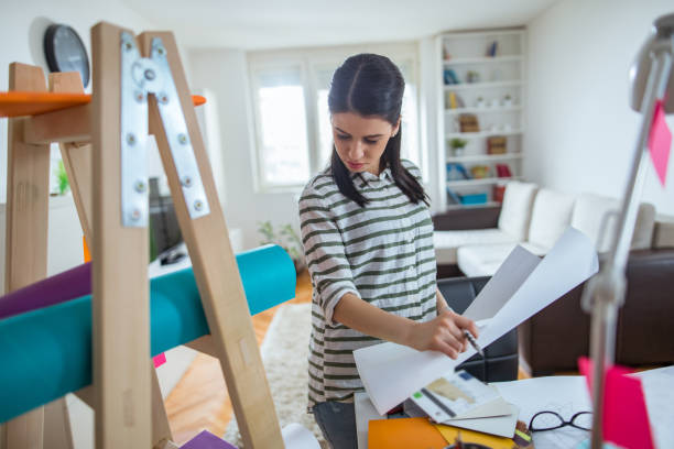 istock Young woman working at home 656844934