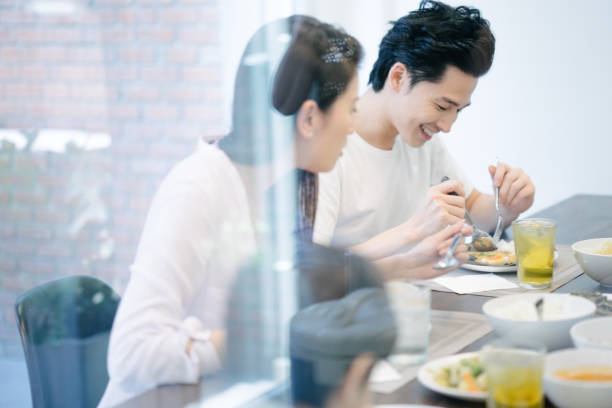 istock Multi-generation family eating in the kitchen 656846210
