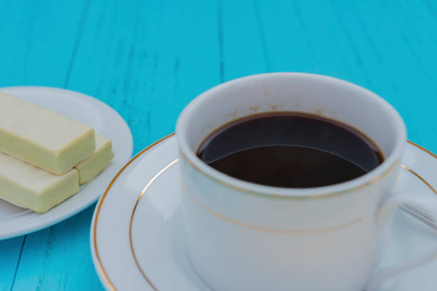 istock side view cup of coffee and white chocolate wafer 656848992