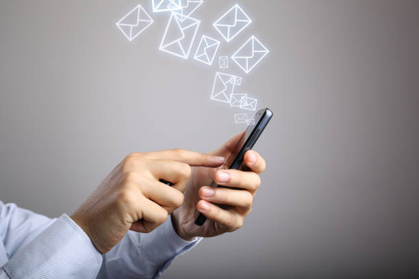 istock Businessman Use Smart Phone With Email Icons 656854458