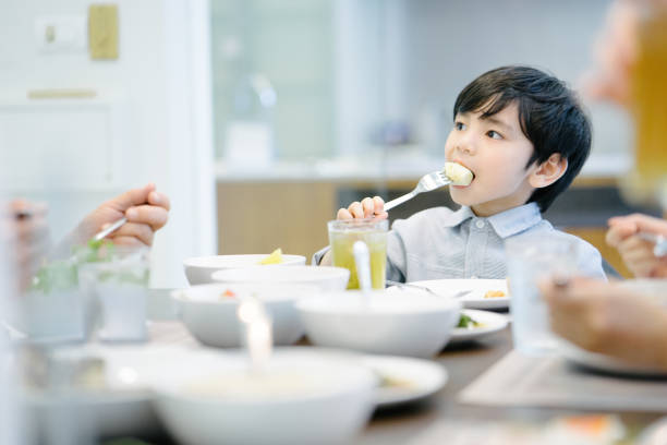 istock Multi-generation family eating in the kitchen 656854870