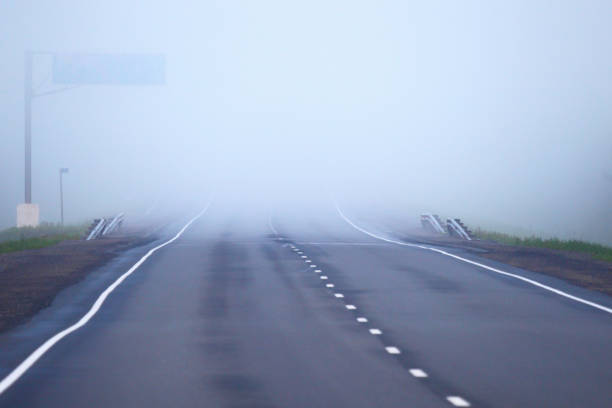 istock Open road.Fog on the freeway. 656854994