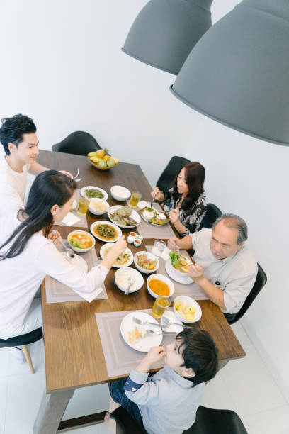 istock Multi-generation family eating in the kitchen 656855276
