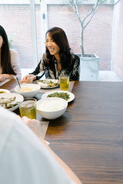 istock Multi-generation family eating in the kitchen 656855652