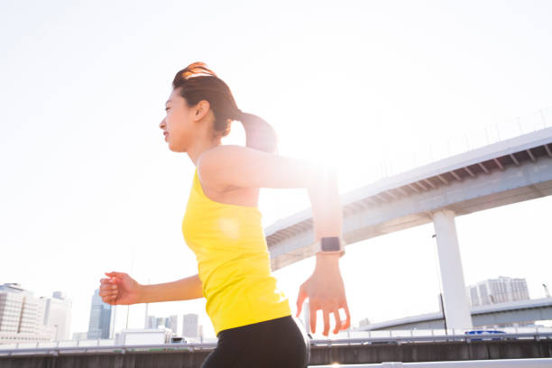 istock A woman running with a smile 656855824