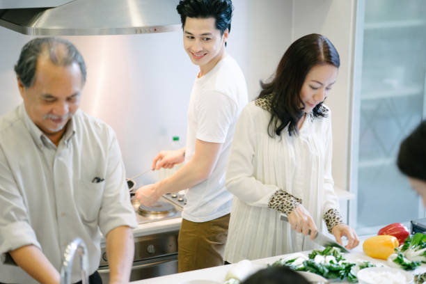 istock Multi-generation family cooking in the kitchen 656858586