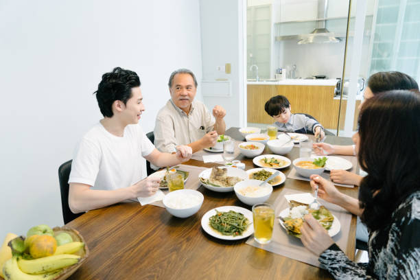 istock Multi-generation family eating in the kitchen 656861060